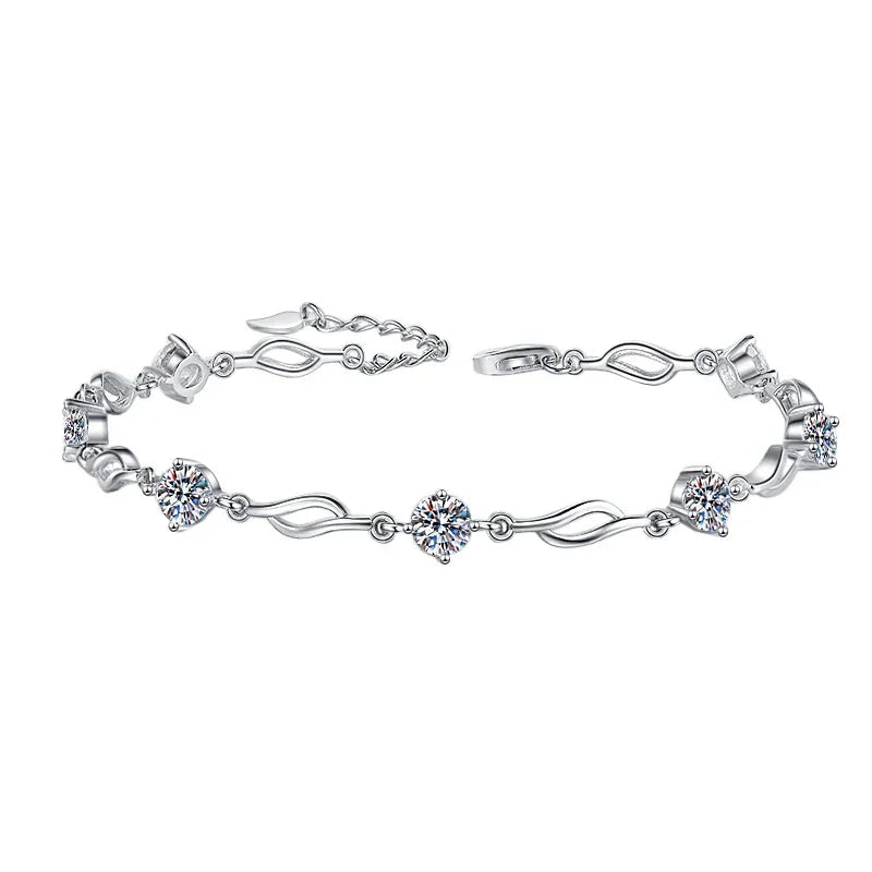 Silver bracelet with diamond-like stones on a white background