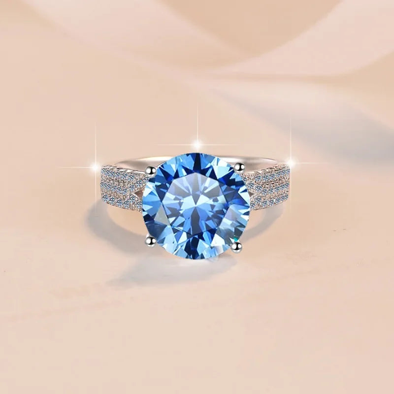 Ring with a blue gemstone on a beige background