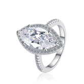 Silver ring with a large clear gemstone on a white background