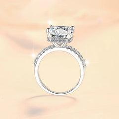 Elegant diamond ring on a soft gradient background
