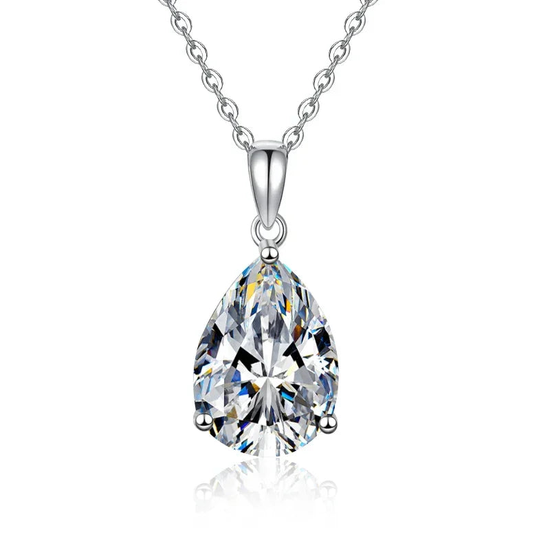 Teardrop-shaped crystal pendant on a silver chain against a white background