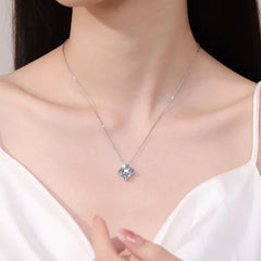 Necklace with a star-shaped pendant worn by a person