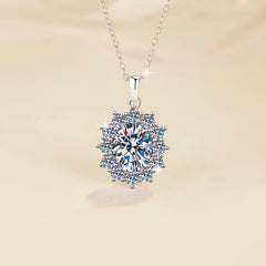 Silver necklace with a diamond pendant on a beige background