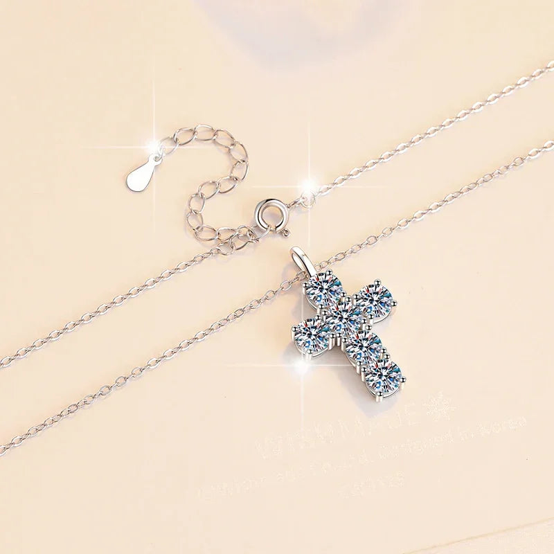 Silver necklace with a sparkling pendant on a beige background