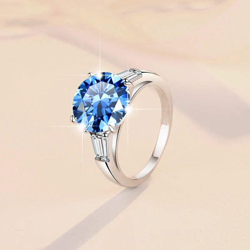 Close-up of prong (claw) setting holding blue moissanite stone