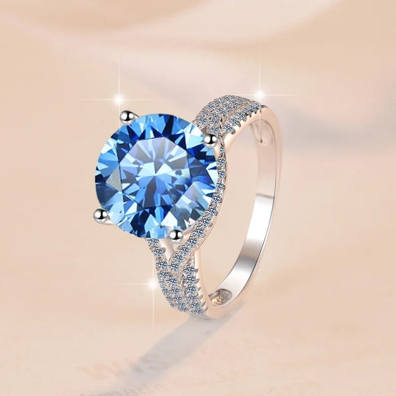 Ring with a large blue gemstone on a beige background