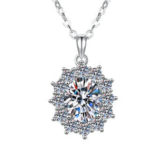 Silver necklace with a round, clear gemstone pendant on a white background