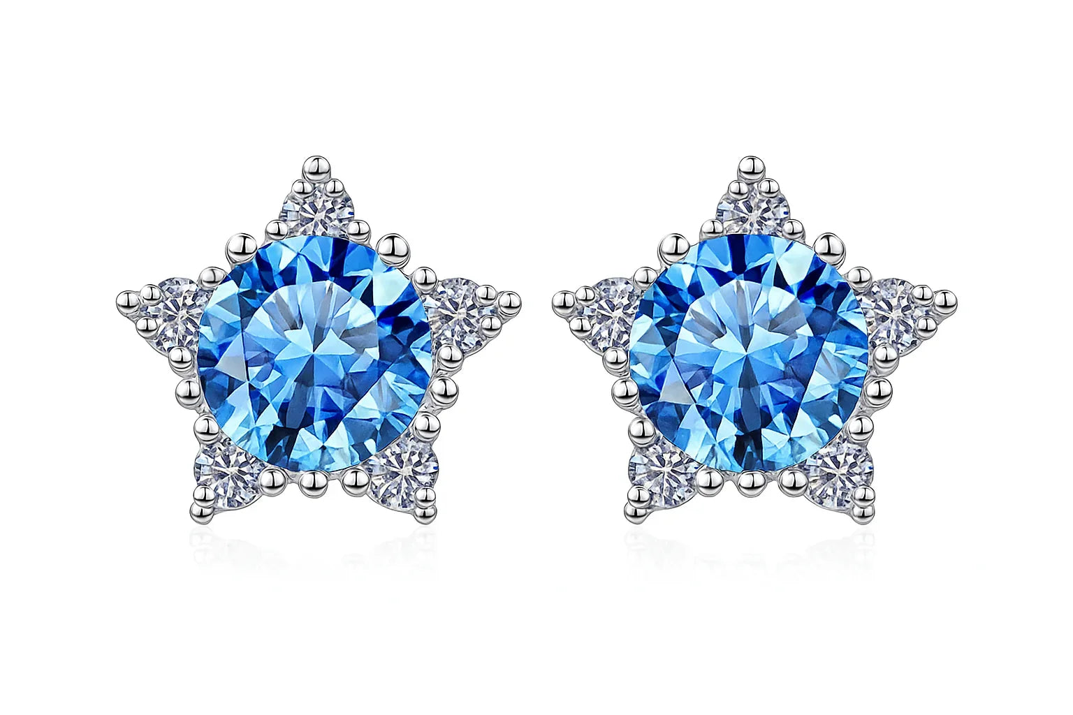 Star-shaped earrings with blue gemstones on a white background