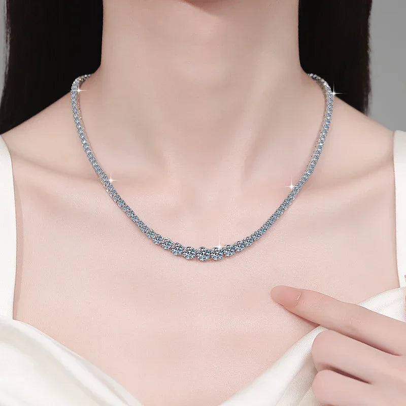 Necklace being worn by a person with a neutral background