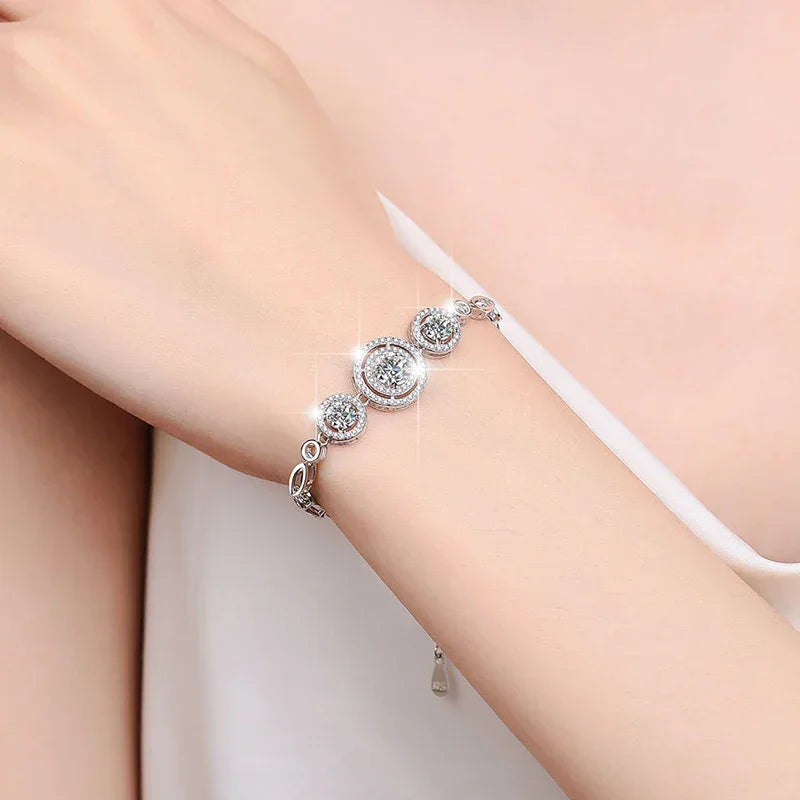 Moissanite bracelet with sparkling round stones on wrist in soft natural lighting