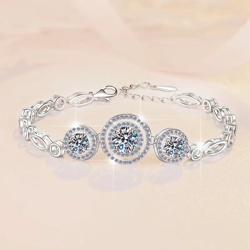 925 sterling silver bracelet with three sparkling round cubic zirconia stones and decorative chain links